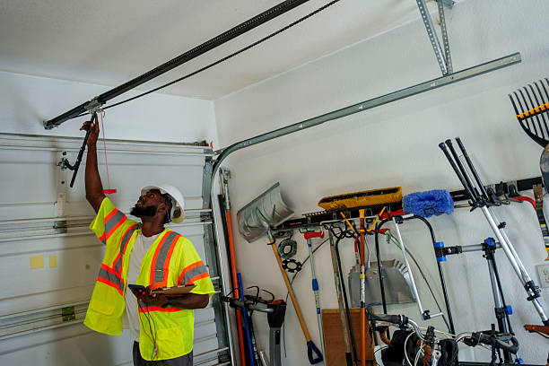 Professional Garage Door Panel Replacement technician working in Newton, AL